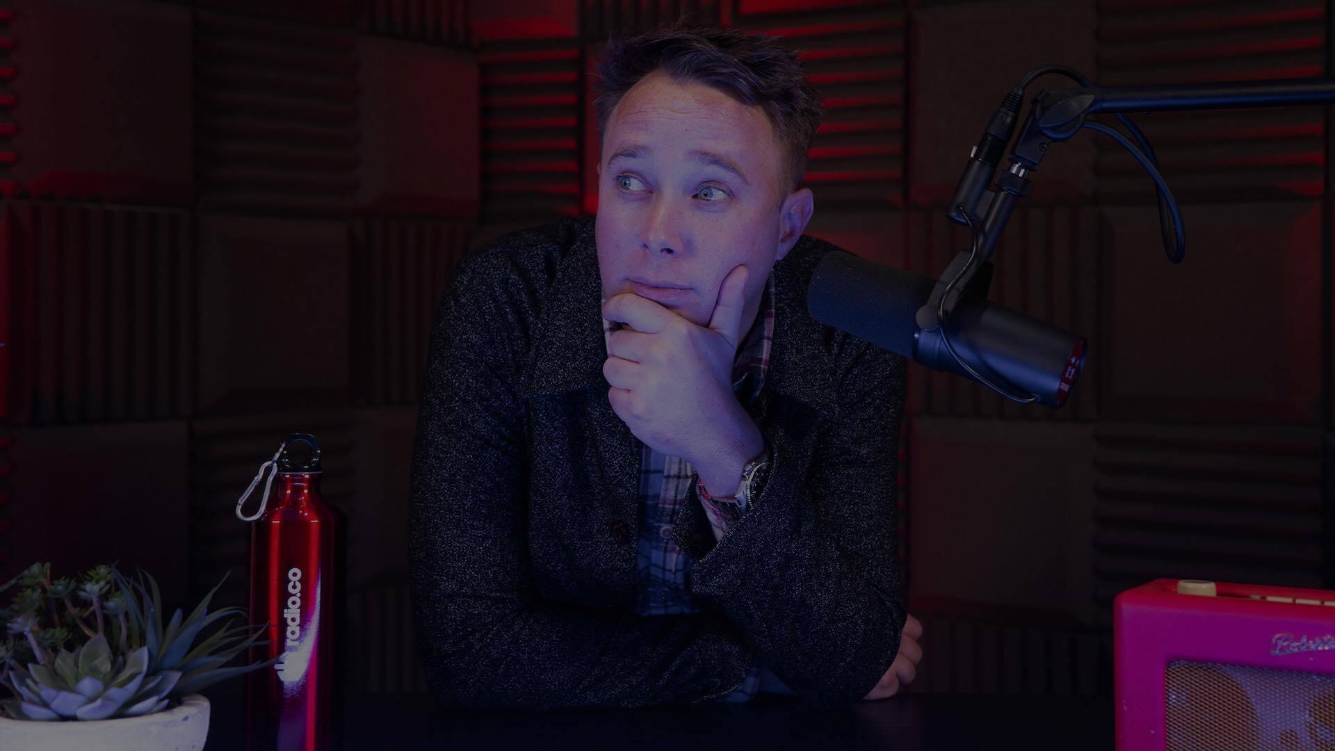 Hero james m thinking dark overlay