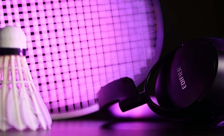 Headphones and badminton equipment