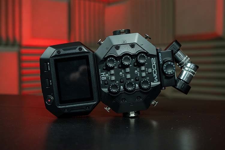 The Zoom H8 interface lay on it's side with the XYH-6 microphones attached.